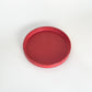 red round catch all tray